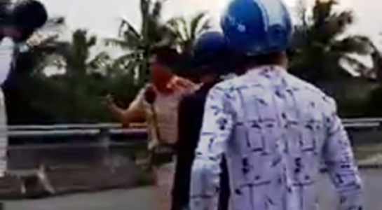 Xôn xao clip cảnh sát giao thông rút súng chĩa vào người dân ở Bến Tre