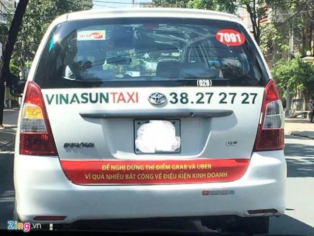 Bung no taxi dan khau hieu phan doi Uber, Grab